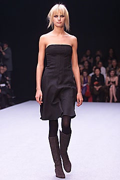 black strapless dress with brown boots