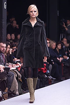 black velvet fitted coat with green boots