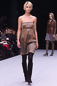 brown silk strapless mini dress and leather jacket