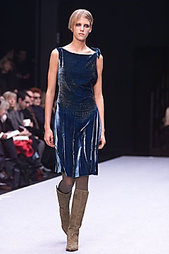 blue silk fitted mini dress with knee-high boots
