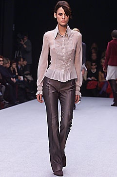 beige silk fitted blouse and brown tailored pants