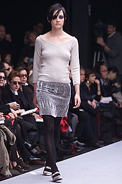 beige fitted top with silver skirt