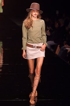 green fitted top with mini skirt