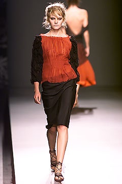 red silk off-shoulder blouse and black pencil skirt