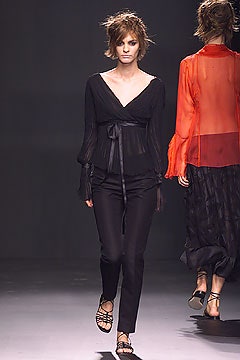 black relaxed blouse and slim pants