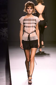 sheer silk top and black shorts
