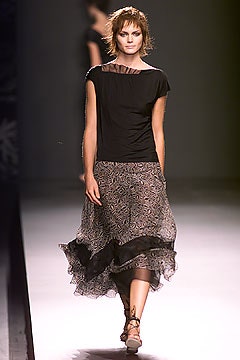 black fitted top with tiered skirt