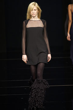 black mini dress with sheer sleeves