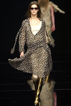 black printed midi dress with gold boots