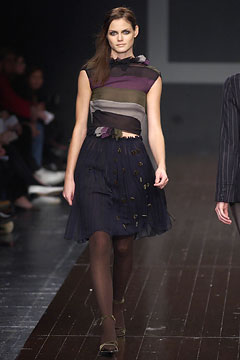 fitted silk top and pleated skirt