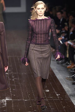 fitted purple top and tailored brown skirt