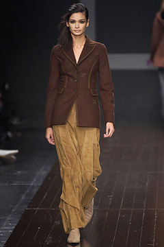 brown tailored blazer with gold tiered skirt