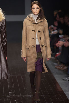 beige wool coat with white top