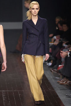 navy tailored blazer with yellow pants