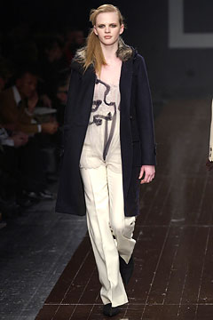 black wool coat with white top