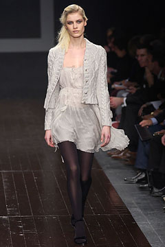 gray fitted jacket and white dress