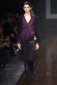 purple silk blouse with black skirt