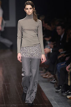 gray fitted turtleneck top and relaxed pants