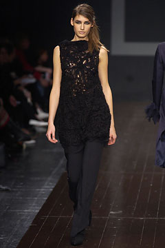 black lace top with fitted pants