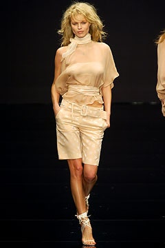 beige silk sleeveless high-neck fitted draped flowing top