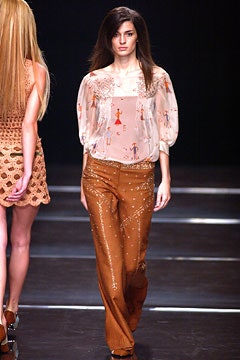 pink silk blouse with brown pants