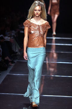 brown vinyl off-shoulder top with blue midi skirt