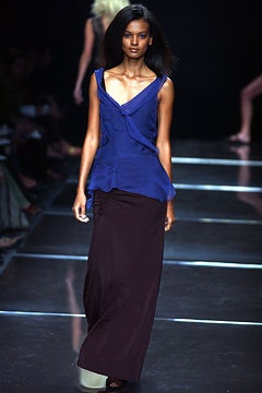 blue silk top with black skirt