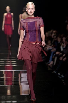 fitted purple top and maroon skirt