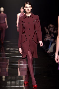 fitted maroon coat with red shoes