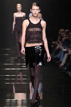 black silk sleeveless high-neck fitted fringed top