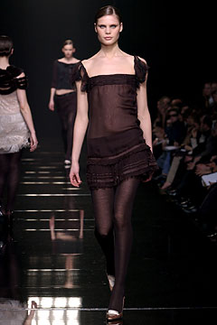 black sheer sleeveless dress
