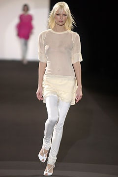 white sheer top with fitted pants