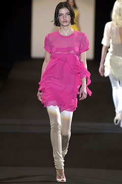 pink ruffled dress with leggings