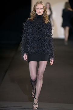 black fringed top and mini skirt