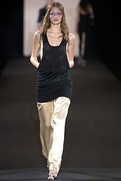 black silk top with beige pants