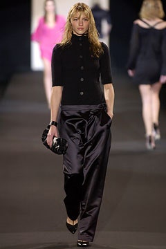 black fitted top and relaxed pants