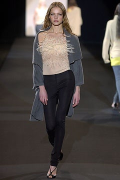 beige fringed top with gray coat