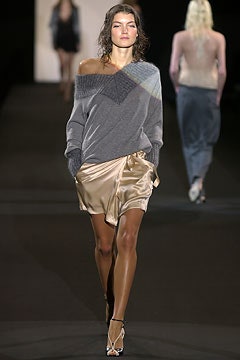 gray off-shoulder sweater and beige skirt