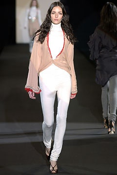 beige silk top with white pants