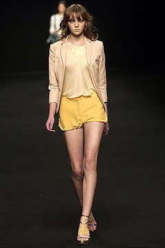 beige blazer with yellow shorts