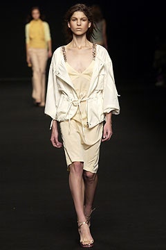 beige fitted midi dress with white jacket