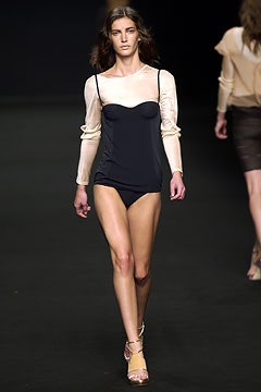 black bikini with beige blouse