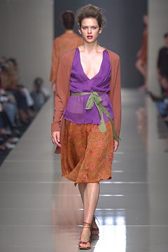 purple top with brown jacket