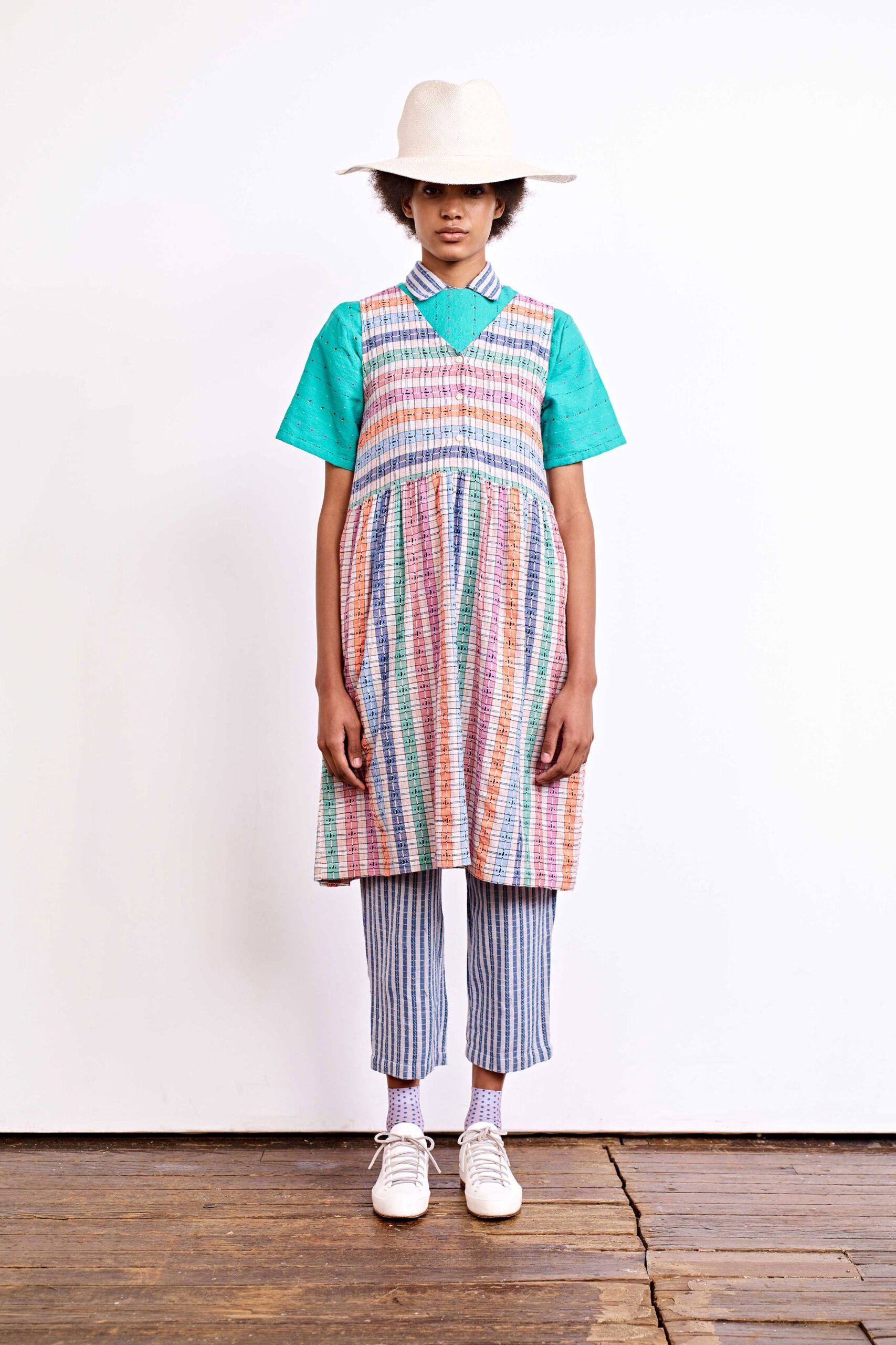 multi-colored tiered dress with striped pants