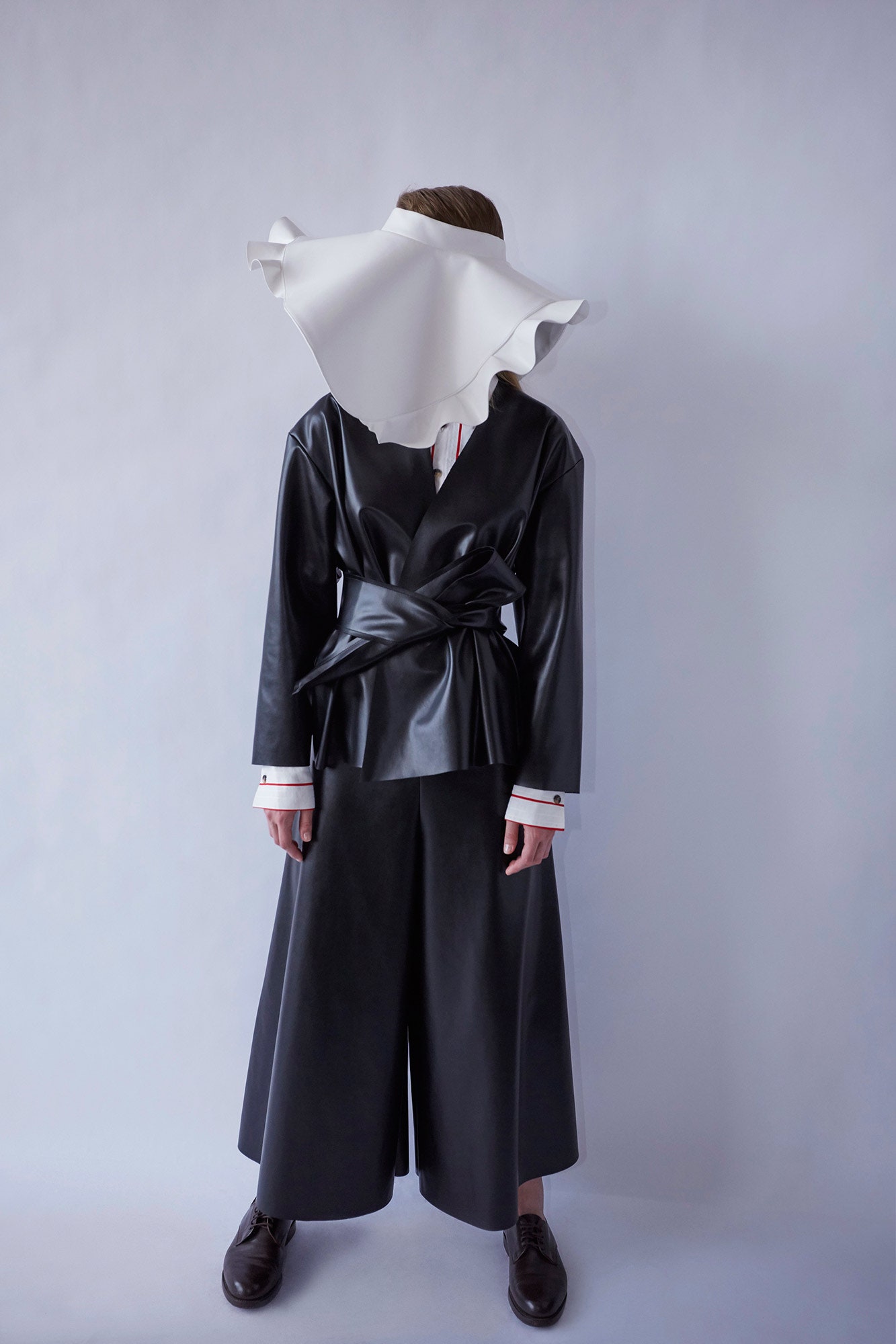 black leather long-sleeve v-neck fitted draped top