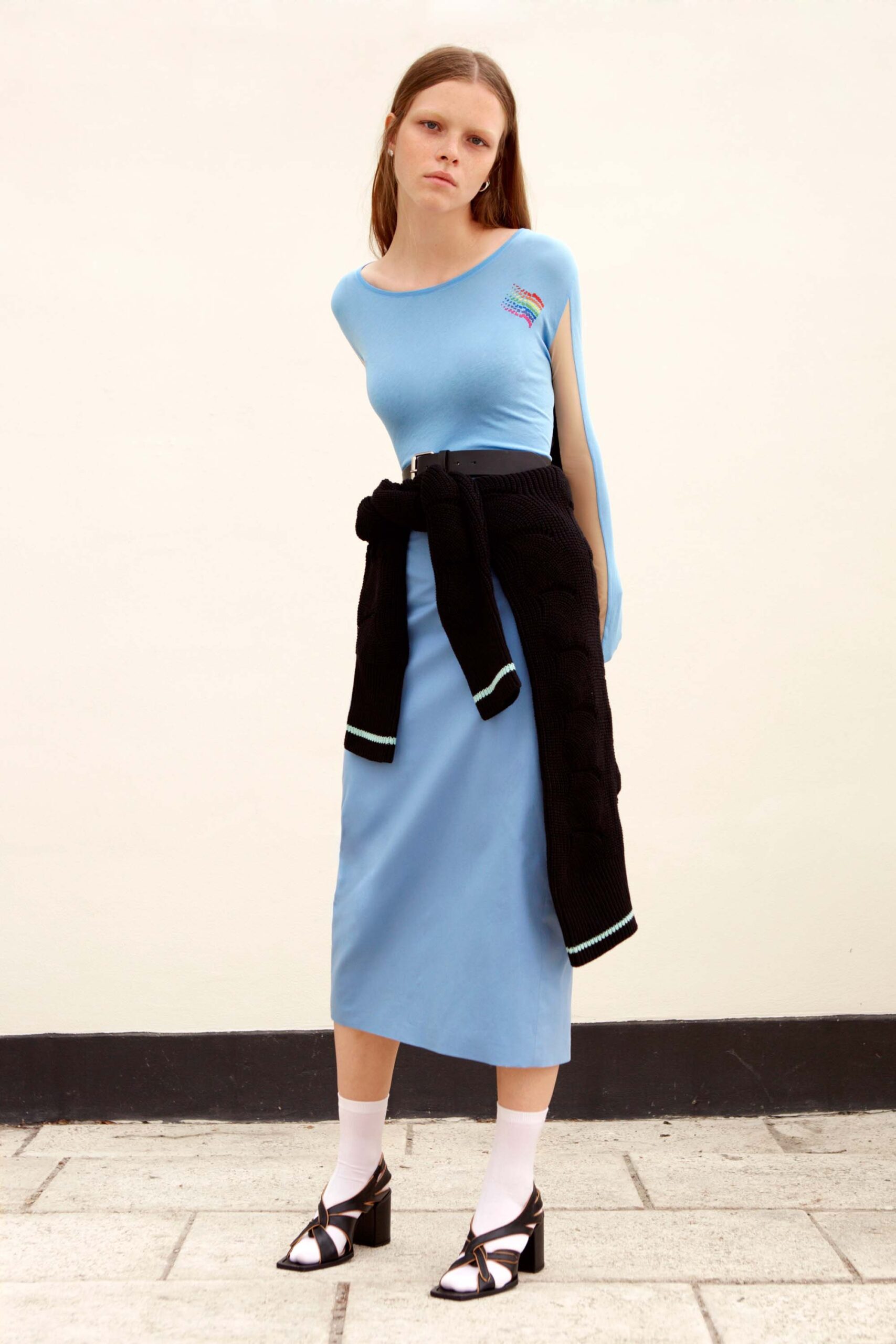 blue fitted midi dress with black sweater