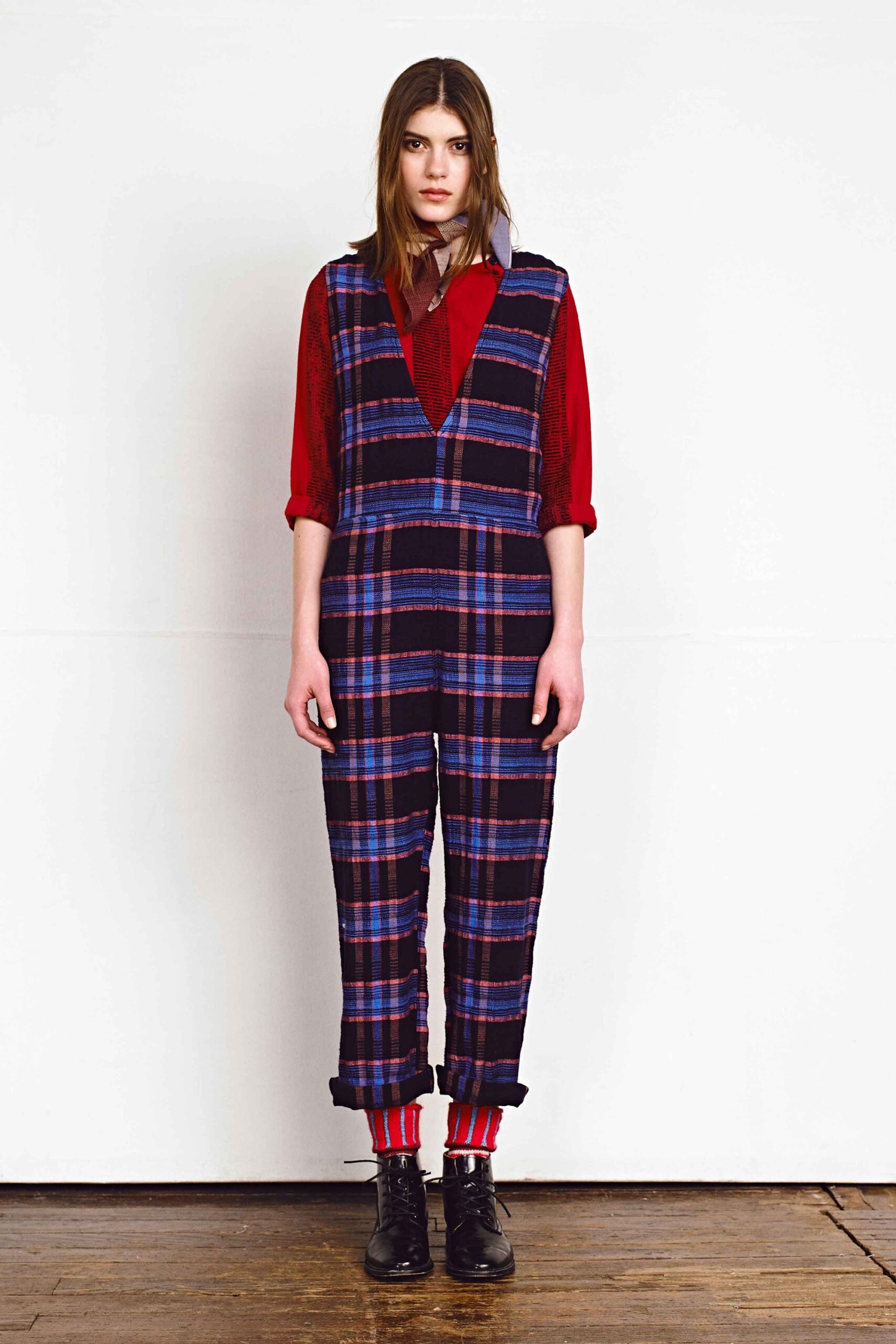 checked jumpsuit with red shirt