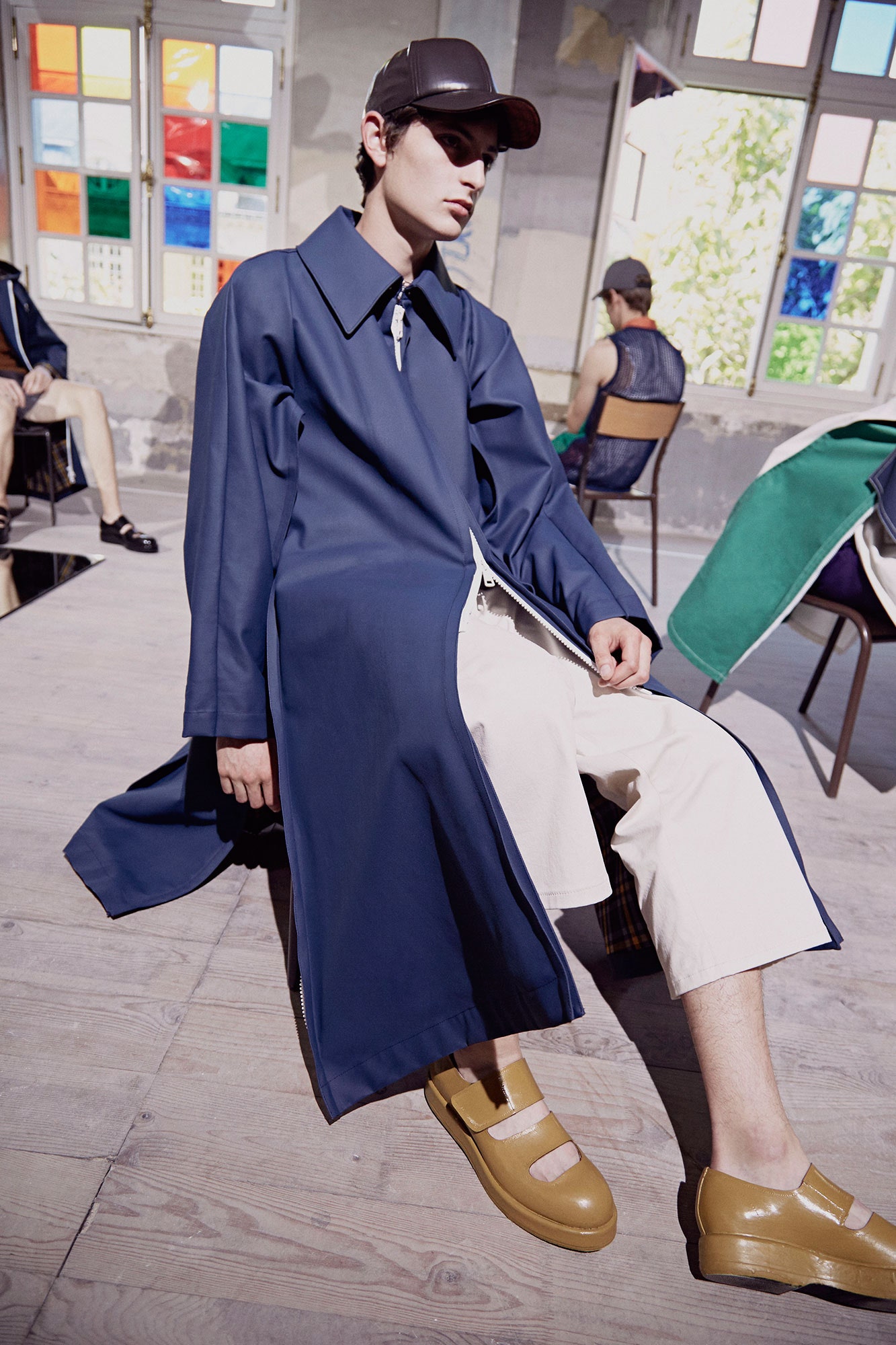 blue vinyl long-sleeve collared relaxed zippered coat