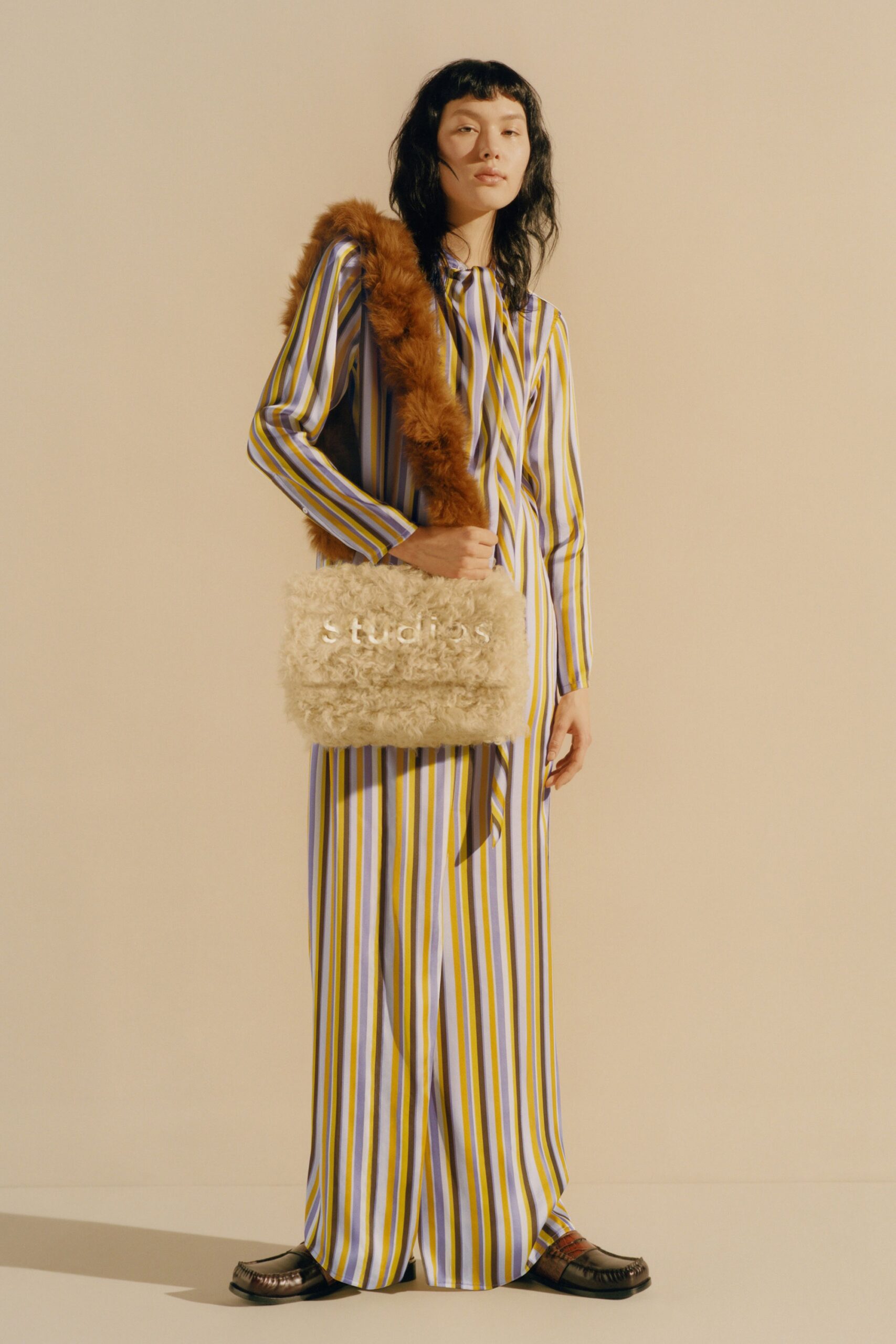 striped maxi dress with faux-fur bag
