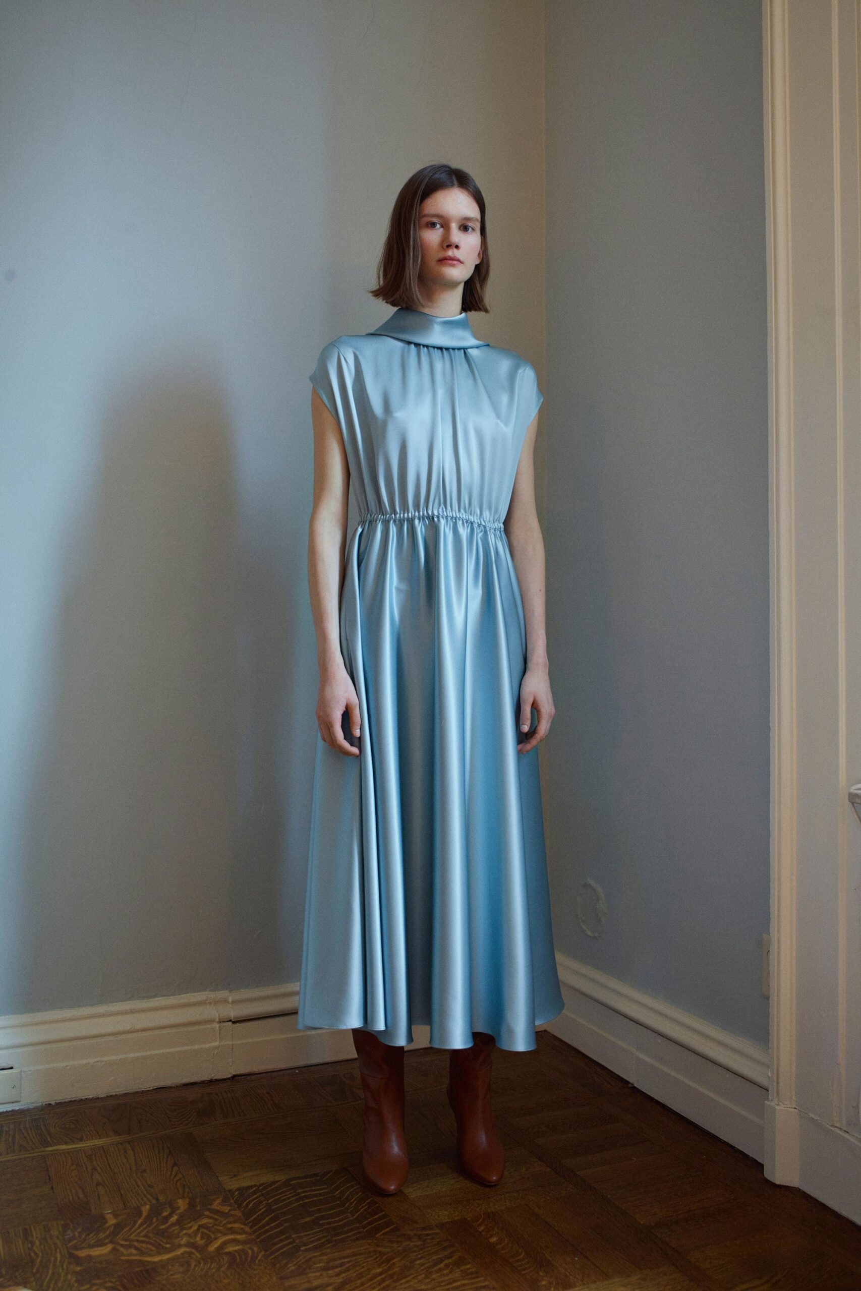 blue silk midi dress with brown boots